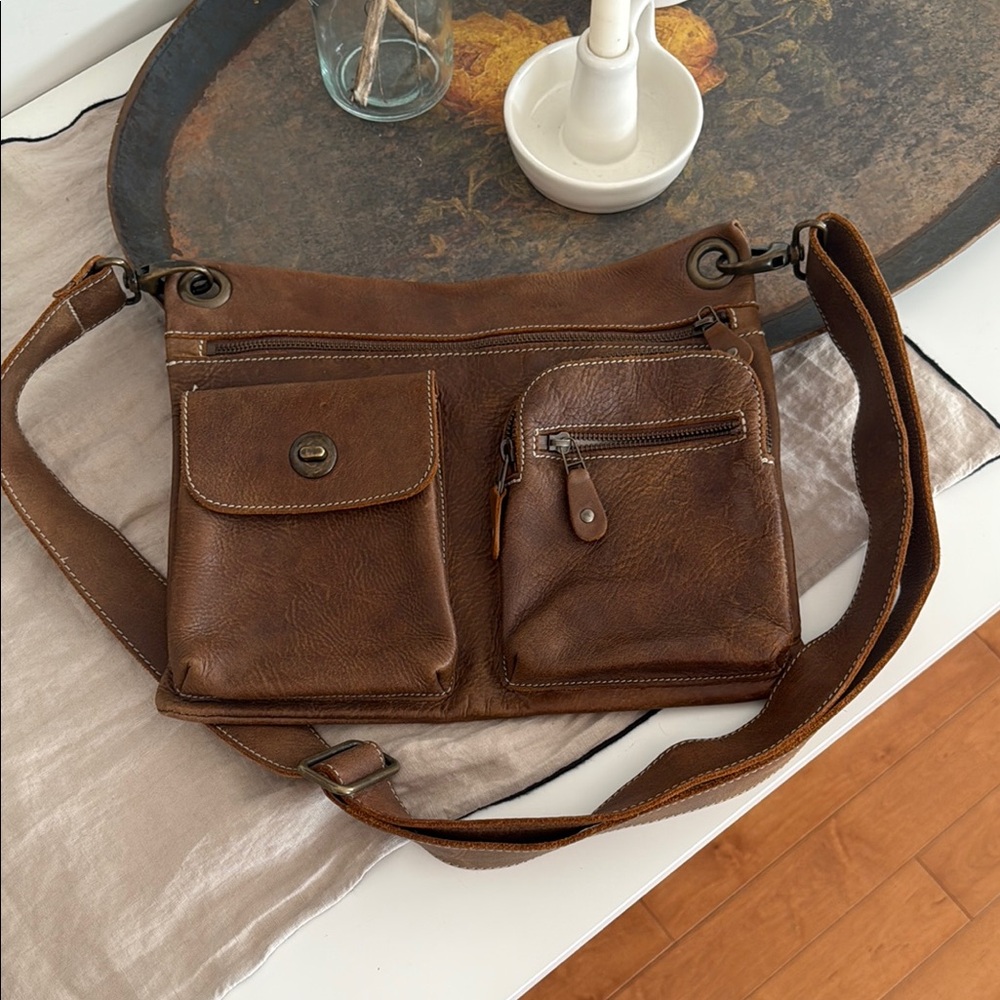 Roots Tribe leather side bag.